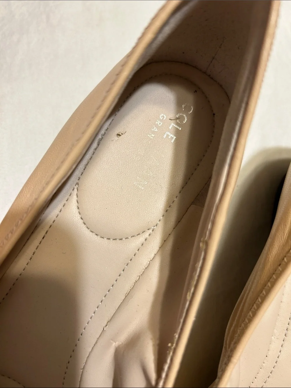 Cole Haan Beige Patent Leather Ballet Flats with Bow Accent